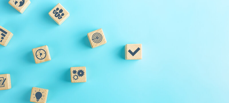 Business process management, Wooden cubes with business strategy icons