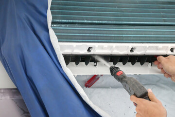 air conditioning cleaning service with water spray