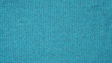 Knitted background. Texture of knitted cotton fabric close up.