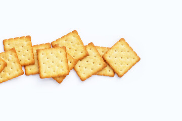Dry cracker cookies on white background.