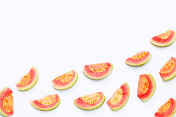 Fresh pink guava on white background.