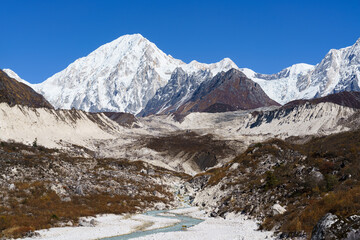 Breathtaking view of Manaslu, the eighth highest mountain in the world, on the Manaslu Circuit Trek in Nepal.