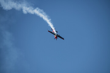 aerobatics on sports planes over the sea in the sky of Jordan