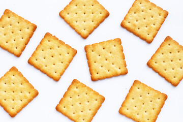 Dry cracker cookies on white background.