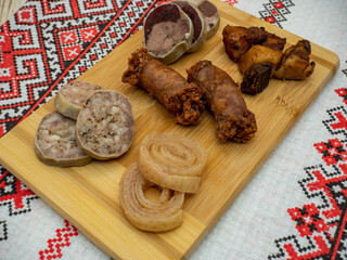 romanian christmas assorted starters on wooden plateau