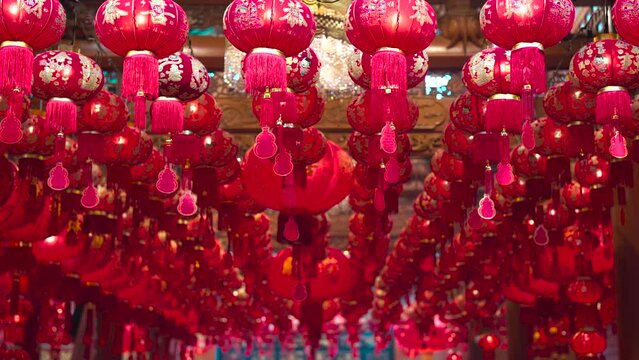 Chinese red Lanterns in temple, happy Lunar New Year holiday. Chinese sentence means happiness, healthy, Lucky and Wealthy