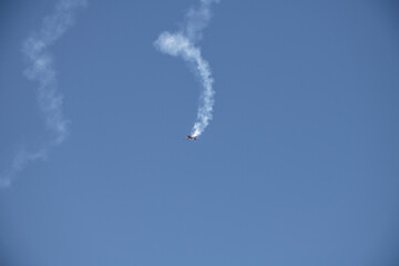 aerobatics on sports planes over the sea in the sky of Jordan