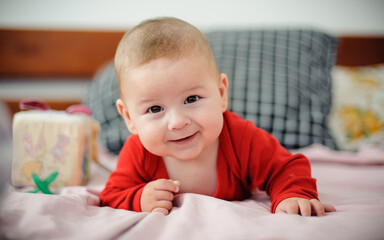 Portrait view of happy cute smiling baby. Joy and happiness concept. Love and family emotion