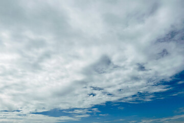 Obraz premium Background from clouds. White, fluffy clouds in blue sky.