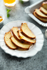 Homemade citrus loaf cake with orange marmalade