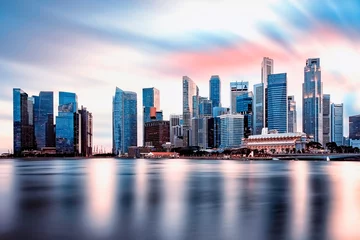 Photo sur Plexiglas Helix Bridge View of Marina Bay at sunset in Singapore City, Singapore