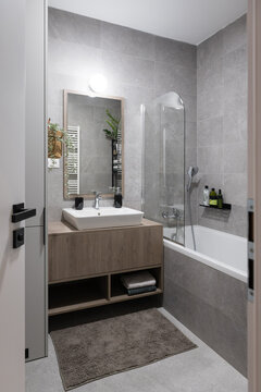 Grey bathroom of modern apartment