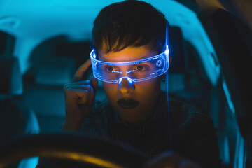 Woman wearing smart glasses in car