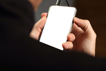 smartphone in hand with white screen