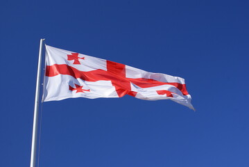 Georgian flag above the sky. Image 