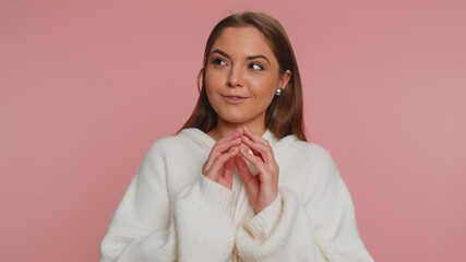 Sneaky cunning young woman with tricky face gesticulating and scheming evil plan, thinking over...