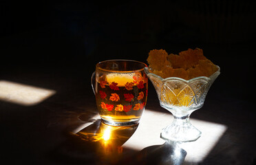 tea and golden sugar