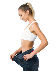 Woman showing her successful weight loss