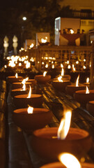 Candles during Loy kratong Festival of Light in Chiang Mai Northern Thailand traditions, mood atmospheric 