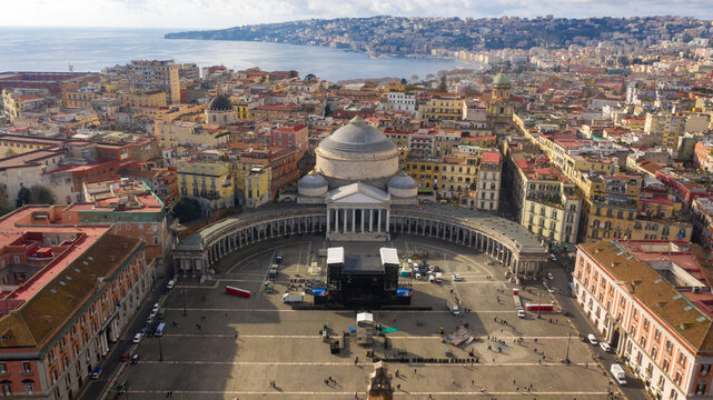 Aerial view of Piazza del Plebiscito, a large public square in the historic center of Naples, Italy. It's bounded by San Francesco di Paola' s church and its hallmark twin colonnades.
