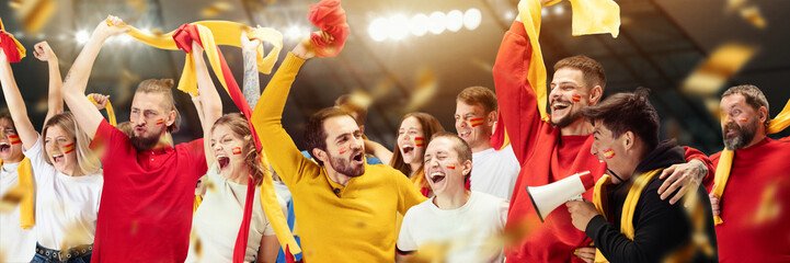 Group of emotive, expressive young people, football, soccer fans cheering Spanish team at the...