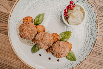 Arancini or arancine, fried rice balls coated with breadcrumbs,  Arancini is a Sicilian, arancini homemade, italian arancini homemade, kulka z ryżem 