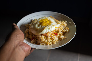 fried rice with side dish of omelet