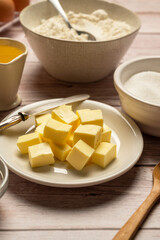 Closeup butter cubes, baking ingredients, cooking background