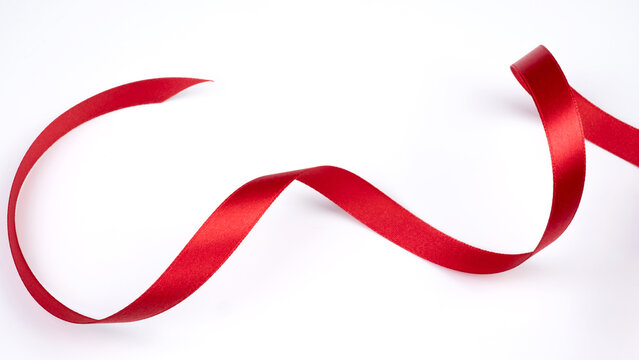 Abstract shape red ribbon isolated on white background.