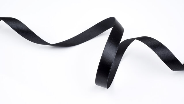 Abstract shape black ribbon isolated on white background.