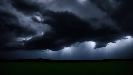 Obraz na płótnie Canvas Black storm clouds at night, Dark sky, and black clouds have high contrast.
