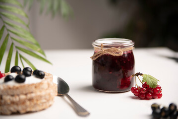 Delicious blackcurrant jam, currant pie and fresh berries