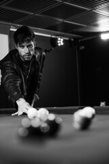handsome man playing pool, boy playing pool black and white photography