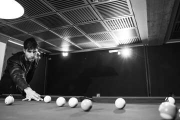 handsome man playing pool, boy playing pool black and white photography
