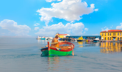 Fototapeta na wymiar Panaromic view of Kordon city coast from Goztepe with fishing boat - Alsancak, Izmir. Izmir is the third most populous city in Turkey 
