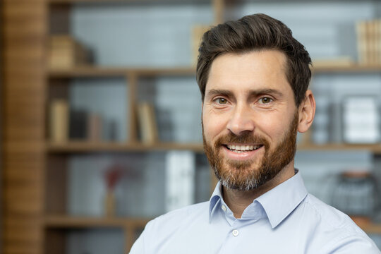 Close Up Businessman In Shirt Smiling And Looking At Camera, Successful Man Inside Office Satisfied With Achievement Results, Mature Investor Financier Headshot.