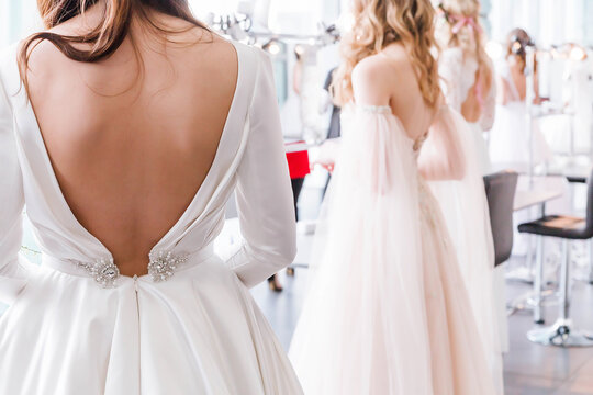 Competition of wedding stylists. Models in wedding dresses and hairstyles are waiting for the jury's evaluation - Powered by Adobe