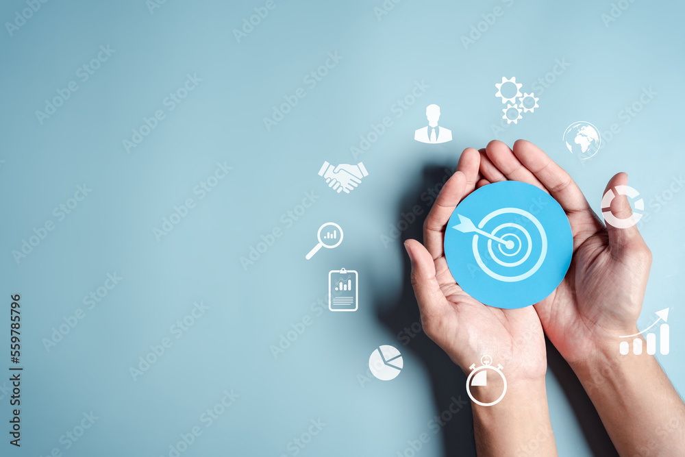 Aufkleber business hands holding target icon, dartboard and arrow for creative and set up business objective t