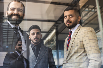 Business people outdoor meeting. Male employees in suits communicate outdoors. Business partners discuss and argue. Relationships and promotion. Teamwork and friendship