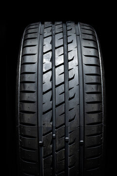 On-road tire tread isolated on black background