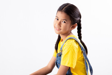 Portrait smiling of child Asian girl looking at camera isolated on white background