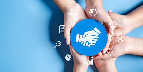 Business hands holding handshake icon, creative and set up business objective target goal,...