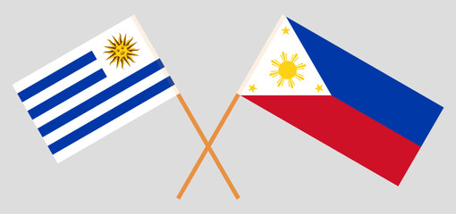 Crossed flags of Uruguay and the Philippines. Official colors. Correct proportion