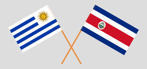 Crossed flags of Uruguay and Costa Rica. Official colors. Correct proportion
