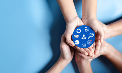 Hands holding light bulb with business target planning development leadership and customer target group, investment growth and success development, achievement, goal, strategy, finance concept.