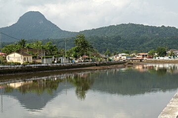 Fototapeta na wymiar View of Santo Antonio The largest city of Principe Island. Rio Papagaio. Sao Tome and Principe. Africa.