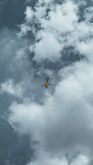 yellow helicopter in the sky of prague