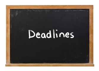 Obraz premium Deadlines written in white chalk on a black chalkboard isolated on white