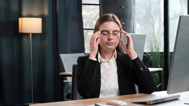 Charming Female Corporate Office Worker Feels Stress, Frustration Works on Computer Pc. Accountant Feeling Project Pressure, Massages Her Head, Works with Statistics, Has Headache. Stock Market Crash.