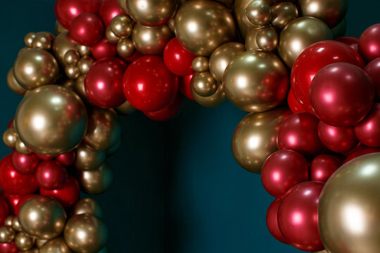 Arch of red and bronze balls on a green background